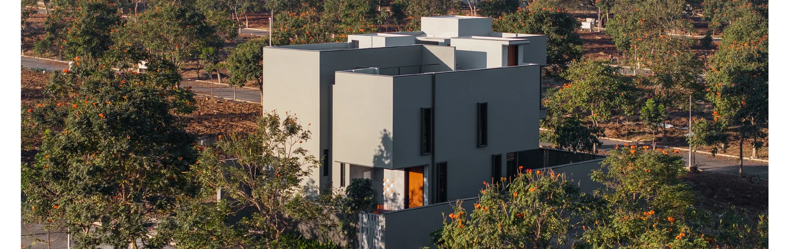 Aerial view of House of Levels within its landscape